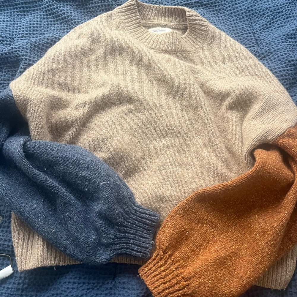 Lightly worn; two toned sweater